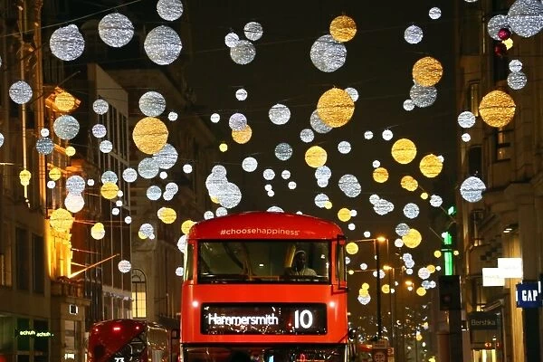 Red bus and Oxford Street Christmas lights in London