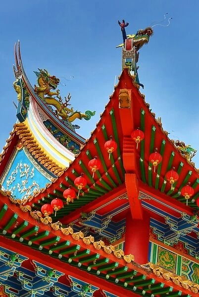 Red lanterns and dragon roof decorations on the Thean Hou Chinese Temple, Kuala Lumpur, Malaysia