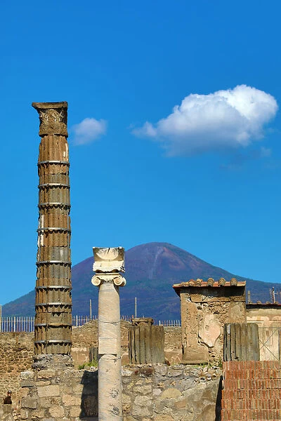 Ruined pillar in the ancient Roman city of Pompeii, Italy