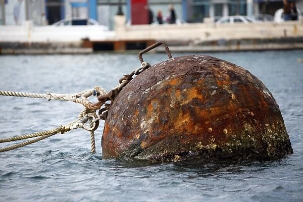 Rusty buoy floating in Valletta harbour, Valletta, Malta