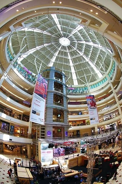 Shops and ceiling at Suria KLCC city centre shopping mall in Kuala Lumpur, Malaysia