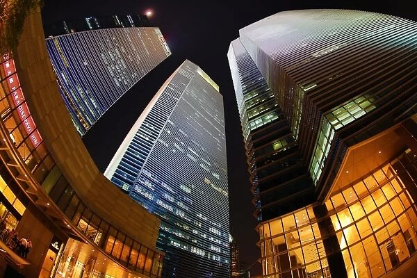 Singapore city skyline skyscrapers and office blocks at night, Republic of Singapore