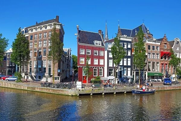 Singel Canal with Traditional Dutch houses in Amsterdam, Holland