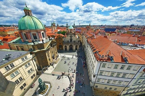 St Francis of Assisi Church and rooftops of the Prague city skyline in the Czech Republic