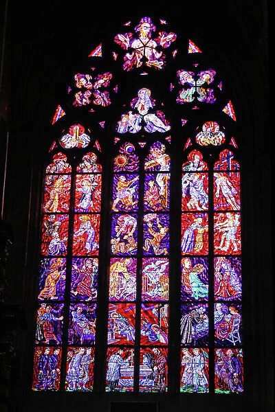 Stained glass window in St. Vitus Cathedral in Prague