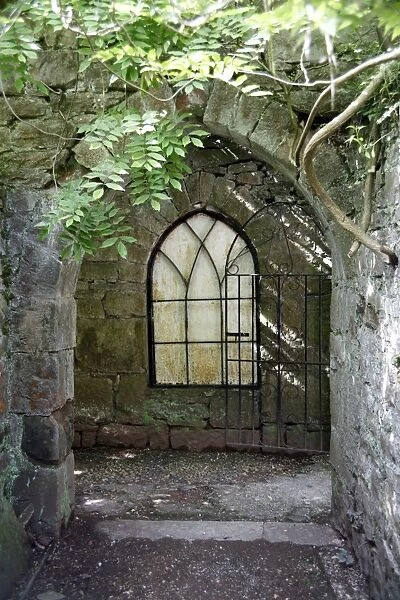 Stone archway. Window in stone archway