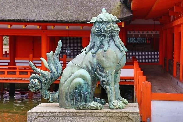 Stone lion statue at Itsukushima Shinto Shrine on Miyajima Island, Hiroshima, Japan