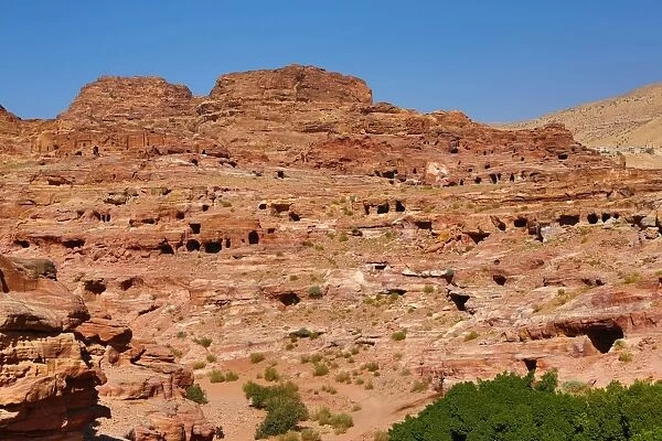 Tombs in sandstone rocks in the rock city of Petra, Jordan