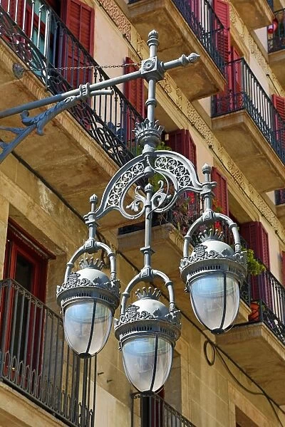 Traditional glass and metal street lamps in Barcelona, Spain