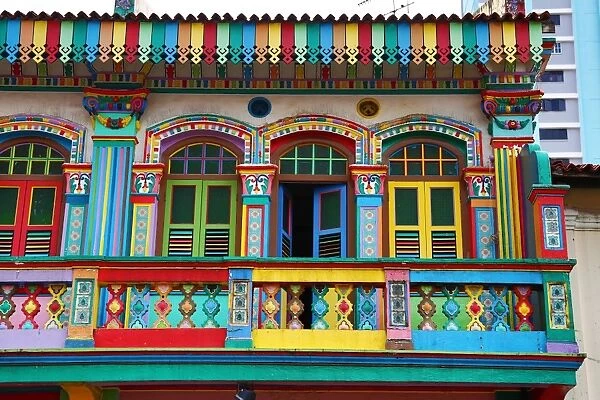 Traditional rainbow coloured house with colourful windows and shutters in Little India in Singapore, Republic of Singapore