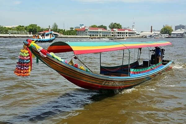 Traditional Thai boat on the Chao Phraya River, Bangkok, Thailand