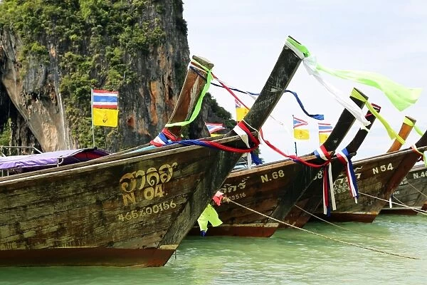 Traditional Thai long tail boats at Phranang Cave Beach, Railay Beach, Krabi, Phuket, Thailand