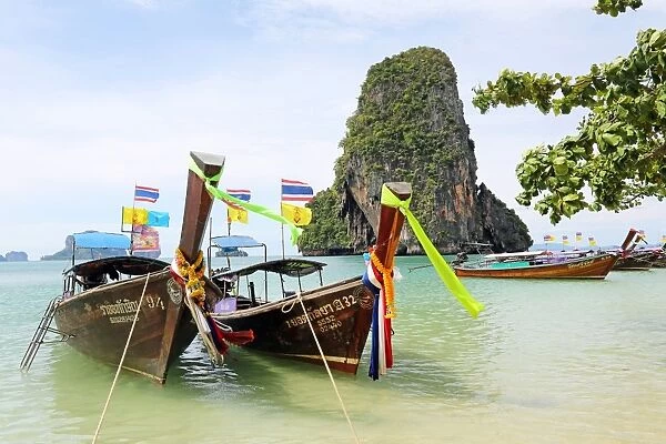 Traditional Thai long tail boats at Phranang Cave Beach, Railay Beach, Krabi, Phuket, Thailand