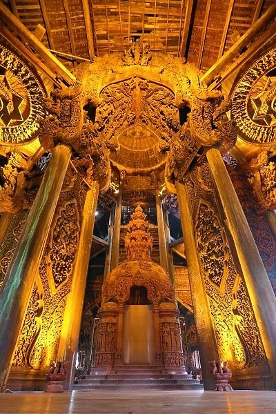 Wooden carving at the Sanctuary of Truth Temple, Prasat Sut Ja-Tum, Pattaya, Thailand showing wood roof decorations