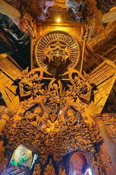 Wooden carving at the Sanctuary of Truth Temple, Prasat Sut Ja-Tum, Pattaya, Thailand showing wood roof decorations