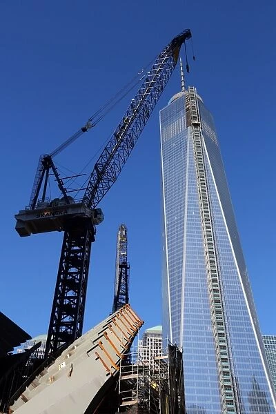 One World Trade Center ( 1 WTC ) building construction with crane, New York. America