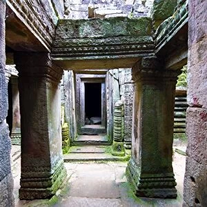 Arched walkways and pillars in the ruins of Bayon Temple, Angkor Thom, Siem Reap
