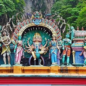 Carved figures on the entrance to the Batu Caves, a Hindu shrine in Kuala Lumpur, Malaysia