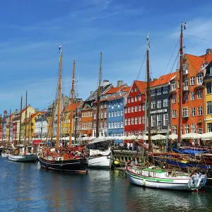 Coloured houses and boats at Nyhavn Quay in Copenhagen, Denmark