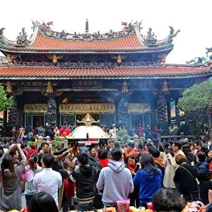Crowds at the Longshan Buddhist Temple at Chinese New Year in Taipei, Taiwan