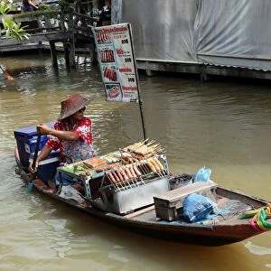 Fast Food stall on a boat at Pattaya Floating Market in Pattaya, Thailand