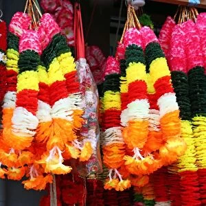 Floral religious garlands hanging in a market in Little India in Singapore, Republic of Singapore