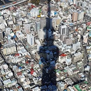 General aerial view of the city skyline with the shadow of the Tokyo Skytree tower, Tokyo, Japan