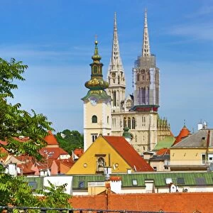 General city skyline view of Zagreb Cathedral with tower renovation and the tower of St