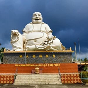 Giant Buddha statue at Vinh Trang Temple, near My Tho, Mekong Delta, Vietnam