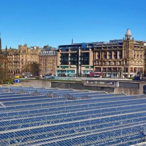Glass panels on the roof of Waverley Station and the Scott Monument in Edinburgh