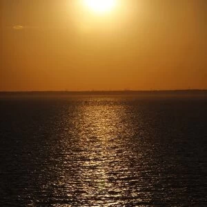 Golden sunset over the sea at dusk