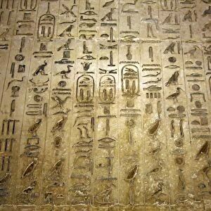 Hieroglyphics on the wall in an underground tomb in the Saqqara Necropolis near Memphis