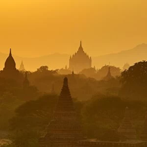 Misty Temples and pagodas at sunset in Bagan, Myanmar (Burma)