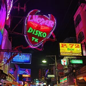 Night scene of illuminated neon signs and illuminations on Walking Street in Pattaya, Thailand