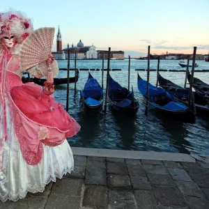 People wearing masks and costumes at the Venice Carnival