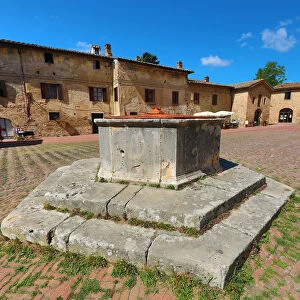 Well in the Piazza Sant Agostino in San Gimignano, Tuscany, Italy