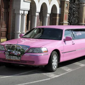 Pink stretch limousine car in St. Petersburg, Russia