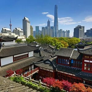 The Pudong city skyline in Shangha in the background of the Yuyuan gardens in the Old City, Shanghai, China
