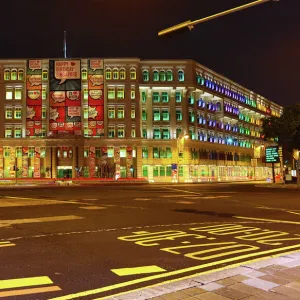 Rainbow coloured lights in the windows of the Old Hill Street Police Station housing the Ministry of Communications and Information in Singapore, Republic of Singapore