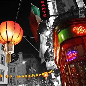Red Chinese Lanterns and lights in Chinatown, London, spot colour