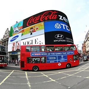 Red London buses at Piccadilly Circus in London, England