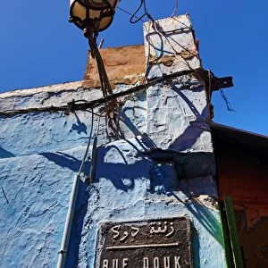 Rue Douk street sign in the streets of the Medina of Rabat, Morocco