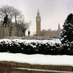 Snow in Parliament Sqaure, the Houses of Parliament and Big Ben, London