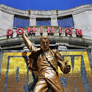 Statue of Freddie Mercury outside We Will Rock You at the Dominion Theatre, London, England