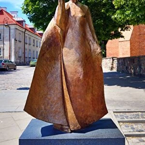Statue of Marie Sklodowska-Curie holding a model of Polonium in Warsaw, Poland