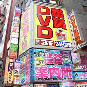 Street scene of DVD Shop and Japanese shop signs in Shibuya, Tokyo, Japan
