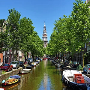 Tower of the Zuiderkerk, southern church, and the Groenburgwal canal in Amsterdam