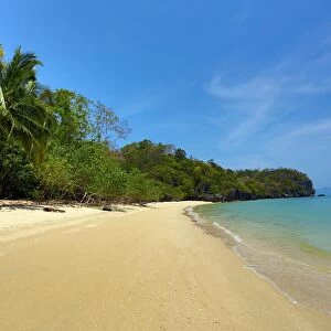 Tropical sandy beach in the Kilim Geoforest Park, Langkawi, Malaysia