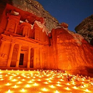 View of the Treasury, Al-Khazneh, at night with candles, Petra, Jordan
