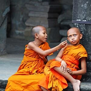 Young Buddhist monks at Angkor Wat Temple in Siem Reap, Cambodia